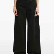 Джинсы-клёш с украшением в виде пирсинга