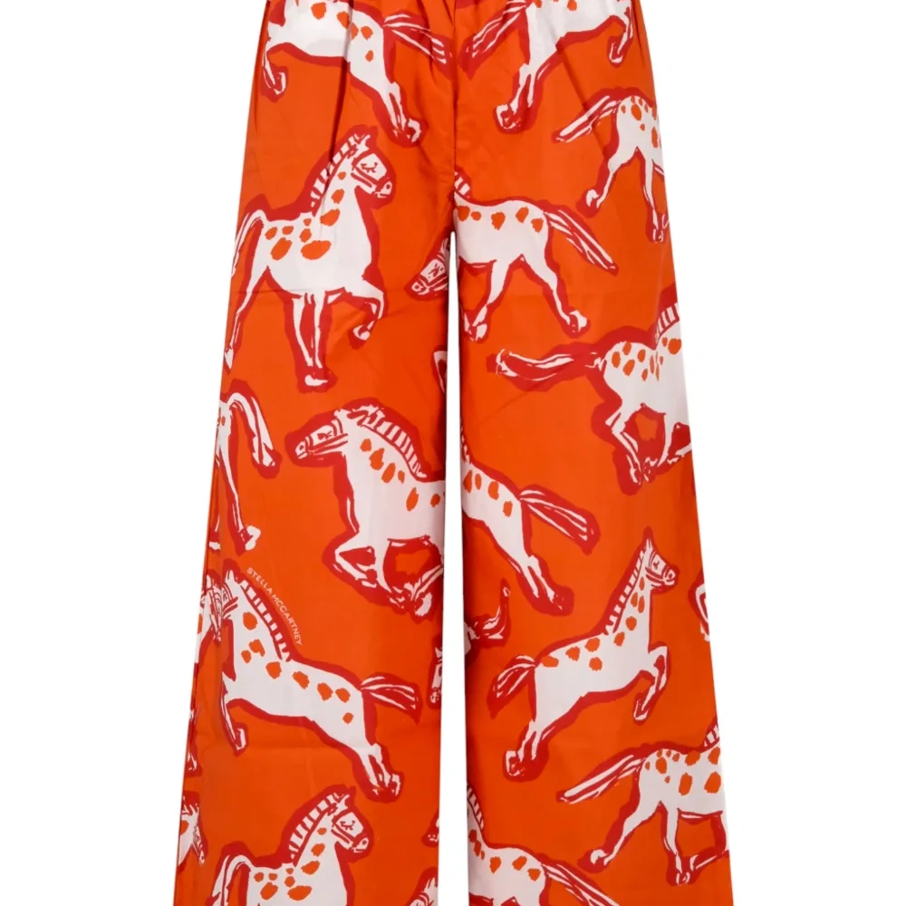 Брюки с узором в лошадей