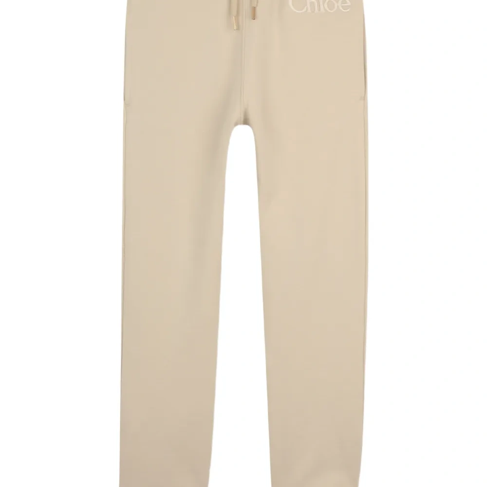 Брюки с вышитым логотипом и завязками