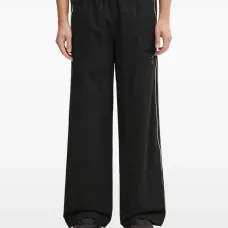 Спортивные штаны с кулиской и кантами в коллаборации с Umbro