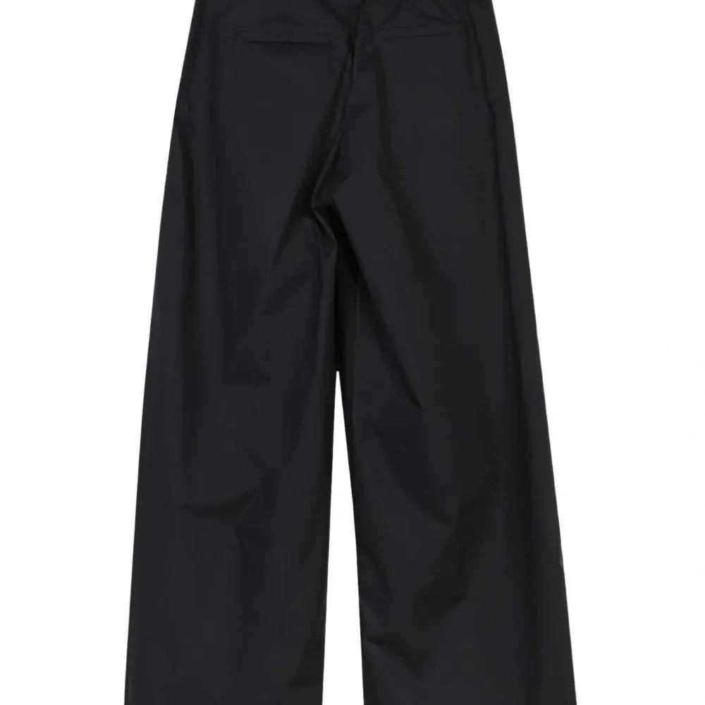 Брюки со складками