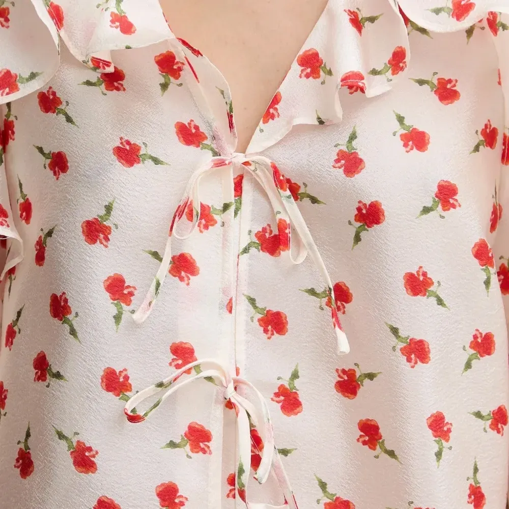 Блузка с оборками и цветочным принтом