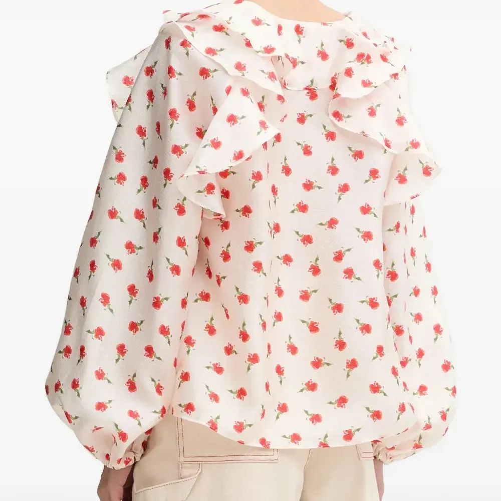 Блузка с оборками и цветочным принтом