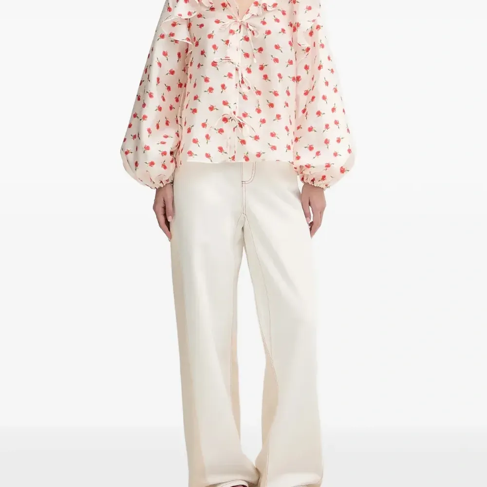 Блузка с оборками и цветочным принтом