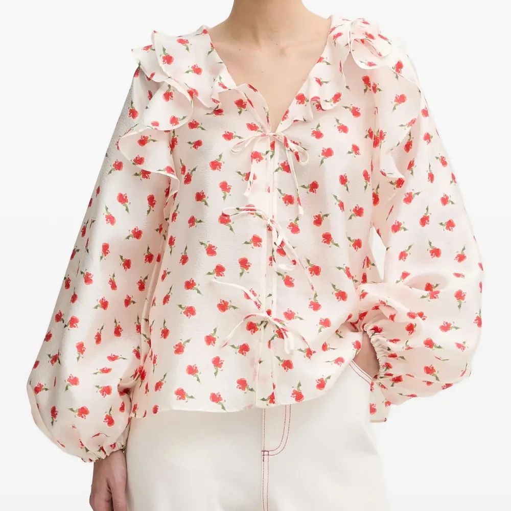 Блузка с оборками и цветочным принтом