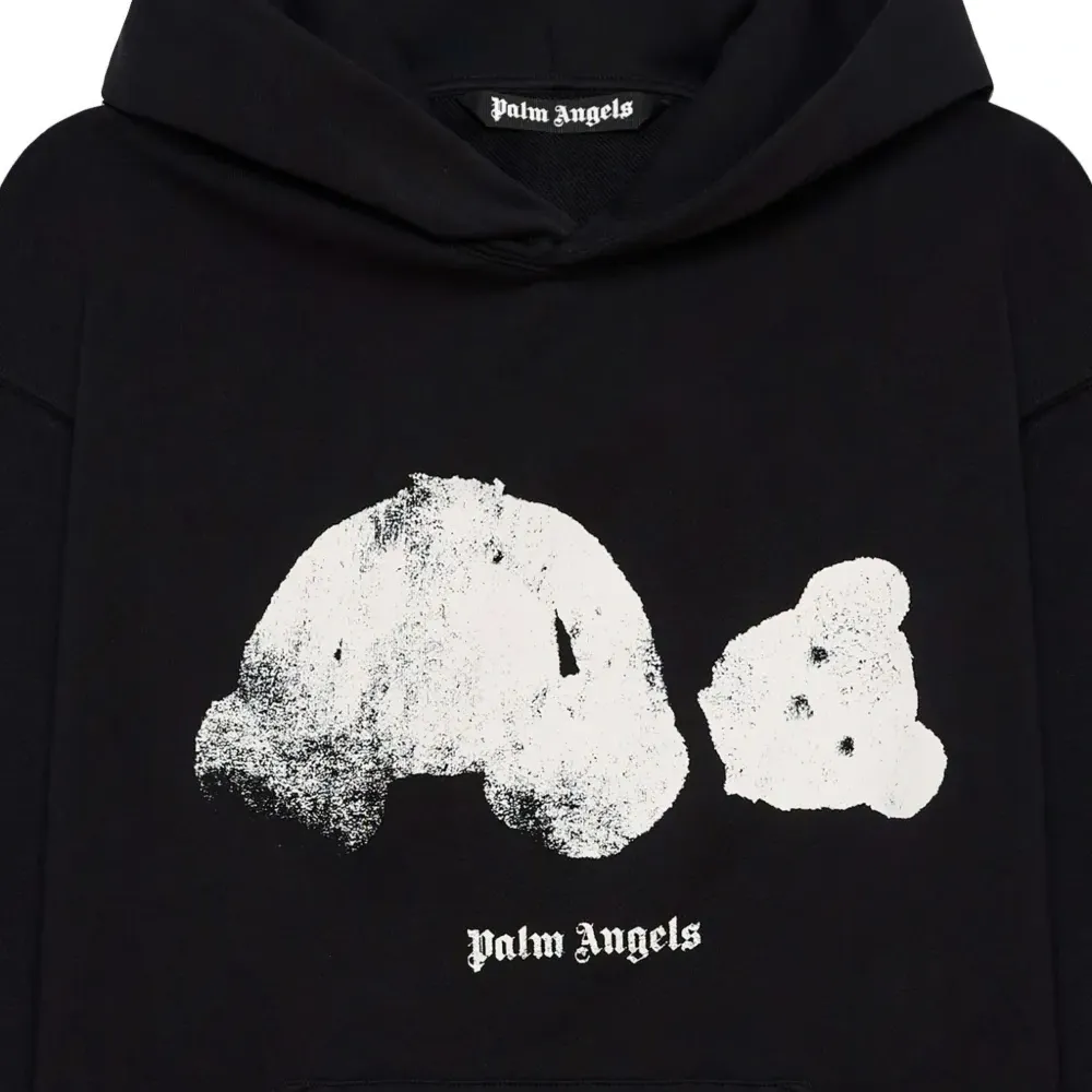 Худи с графичным принтом "Сломанный медведь" и эффектом распыления Худи с графичным принтом "Сломанный медведь" и эффектом распыления