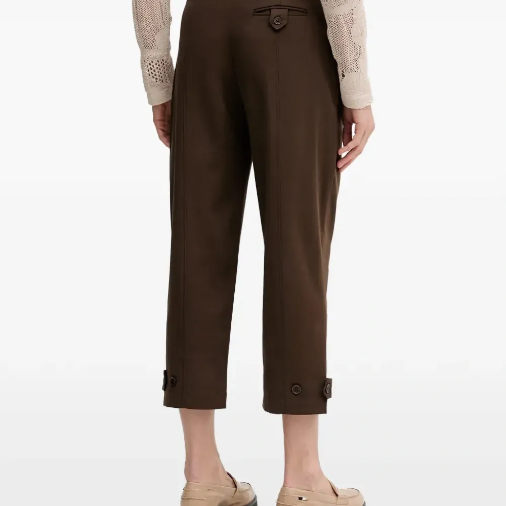 Брюки с манжетами на пуговицах