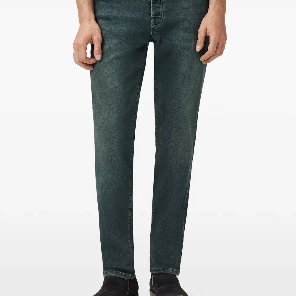 Джинсы из состаренного денима