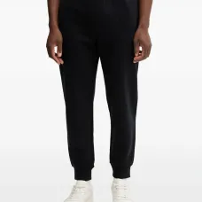 Брюки с металлической нашивкой-логотипом