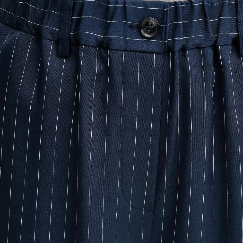 Брюки в полоску на пуговицах