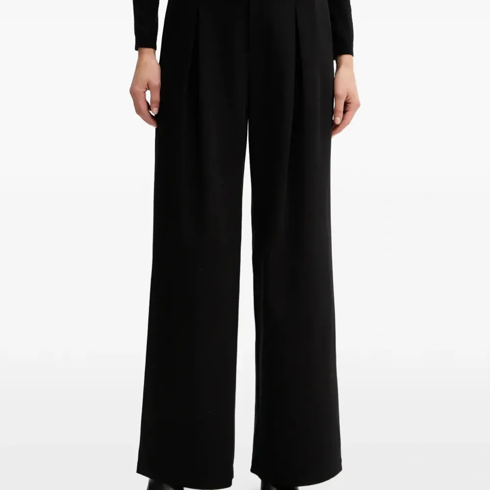 Плиссированные брюки