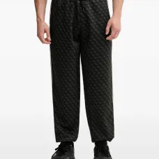 Спортивные брюки с боковой полосой и принтом