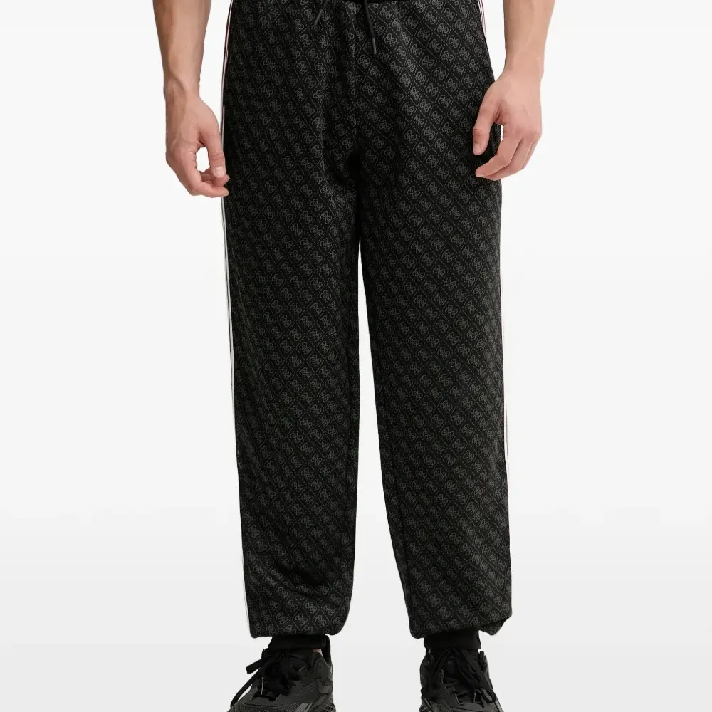 Спортивные брюки с боковой полосой и принтом