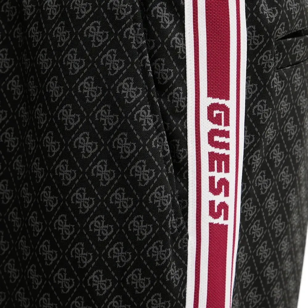 Спортивные брюки с боковой полосой и принтом