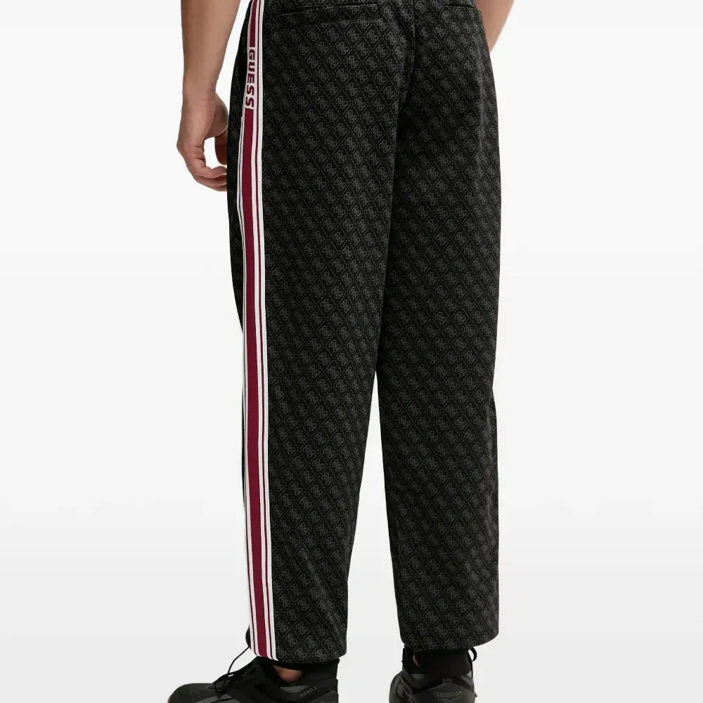 Спортивные брюки с боковой полосой и принтом