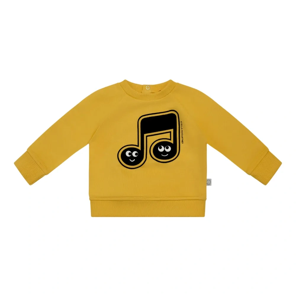 Свитер с музыкальными нотами Свитер с музыкальными нотами