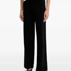 Широкие брюки с заклёпками