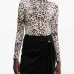 Блузка с анималистичным принтом и сборками