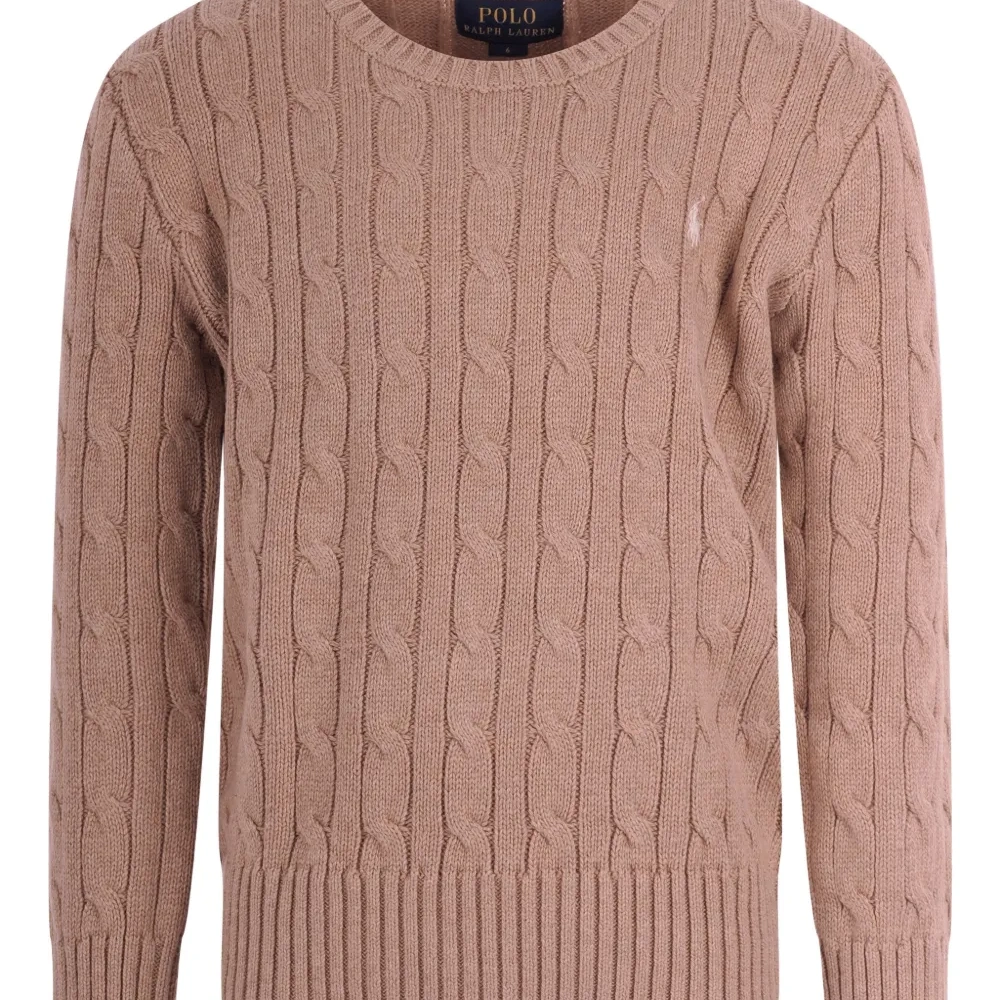 Свитер с косами