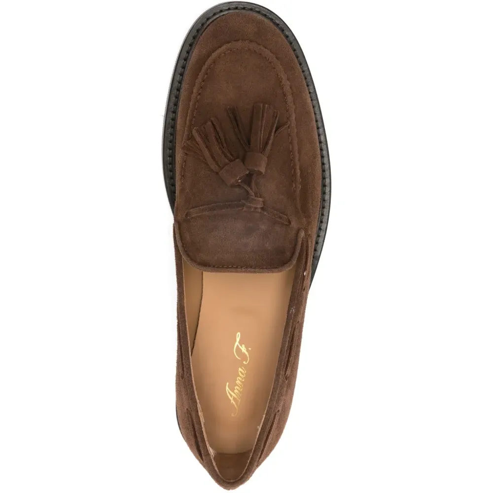 Кожаные лоферы с кисточками