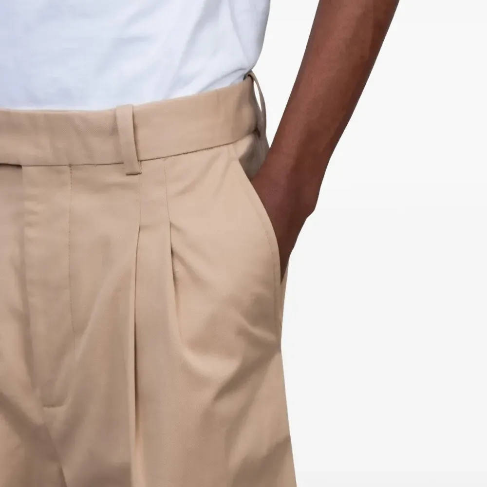 Плиссированные брюки