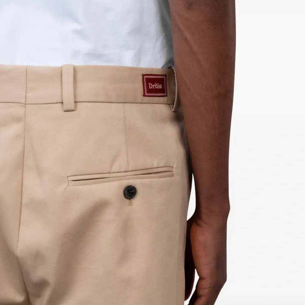 Плиссированные брюки