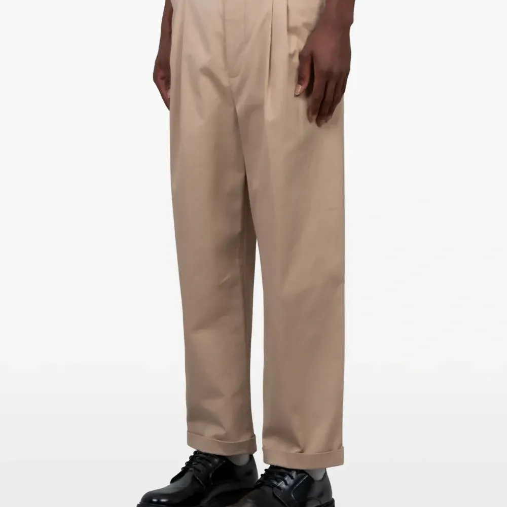 Плиссированные брюки