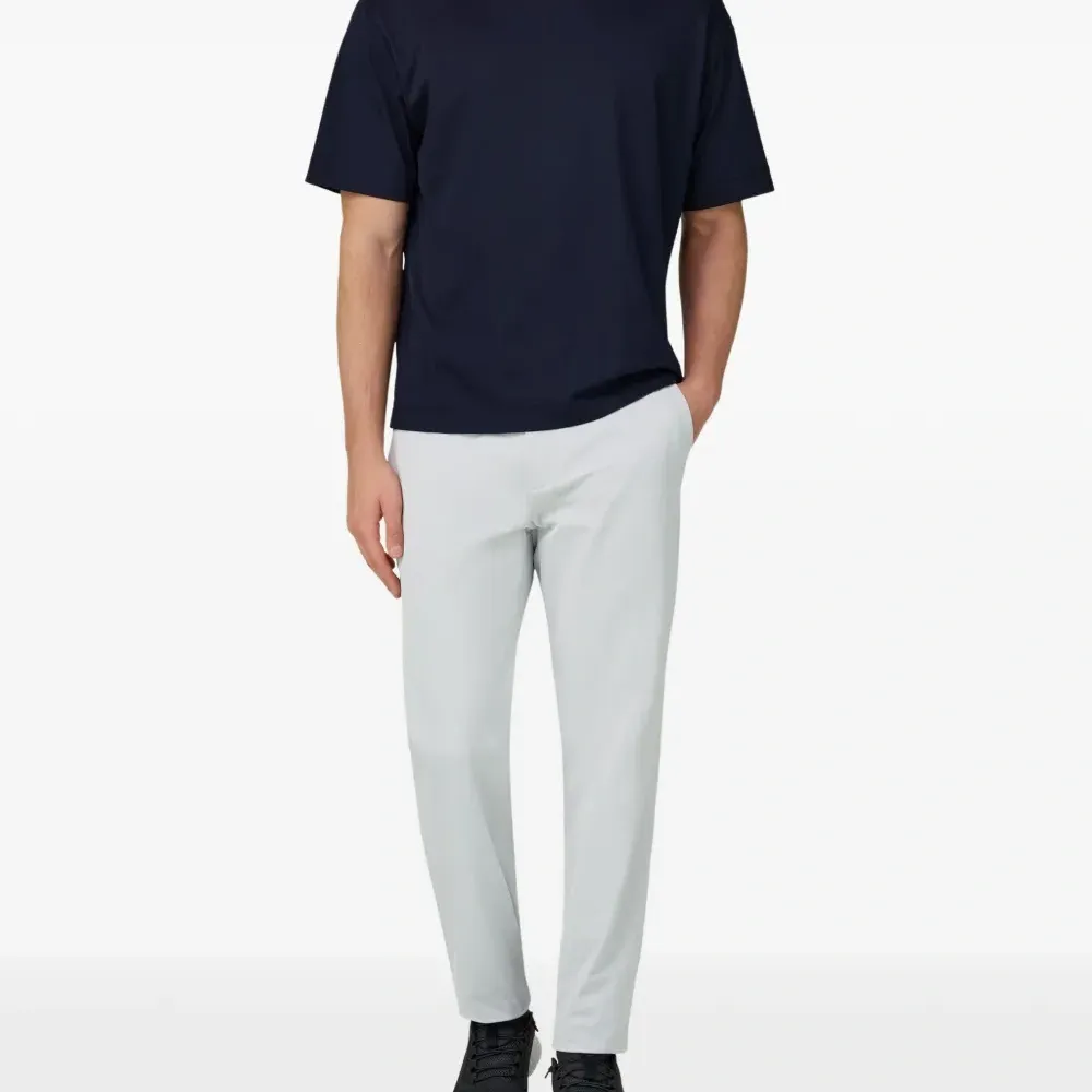 Брюки из стрейч-материала с карманом на молнии Брюки из стрейч-материала с карманом на молнии