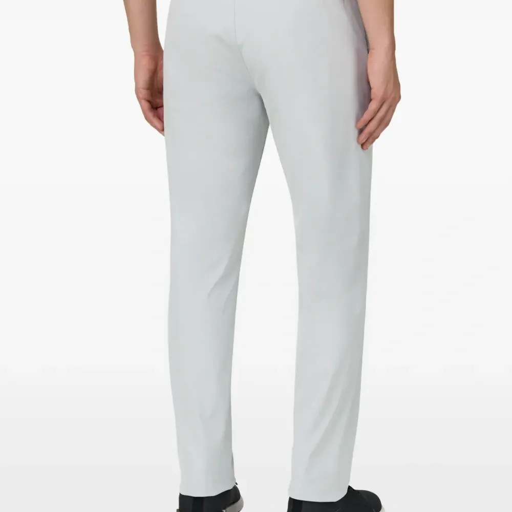 Брюки из стрейч-материала с карманом на молнии Брюки из стрейч-материала с карманом на молнии