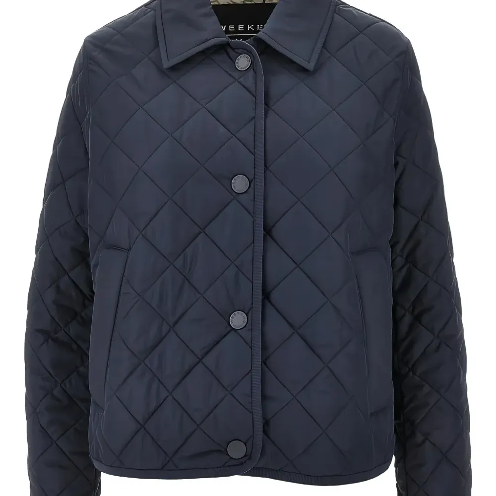 Стёганая куртка с воротником поло