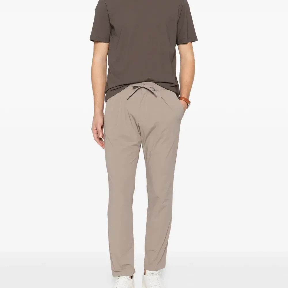 Плиссированные брюки на кулиске