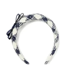 Повязка на голову с бантом и клетчатым узором Повязка на голову с бантом и клетчатым узором