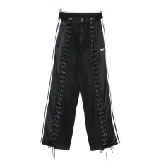 Брюки в полоску с люверсами