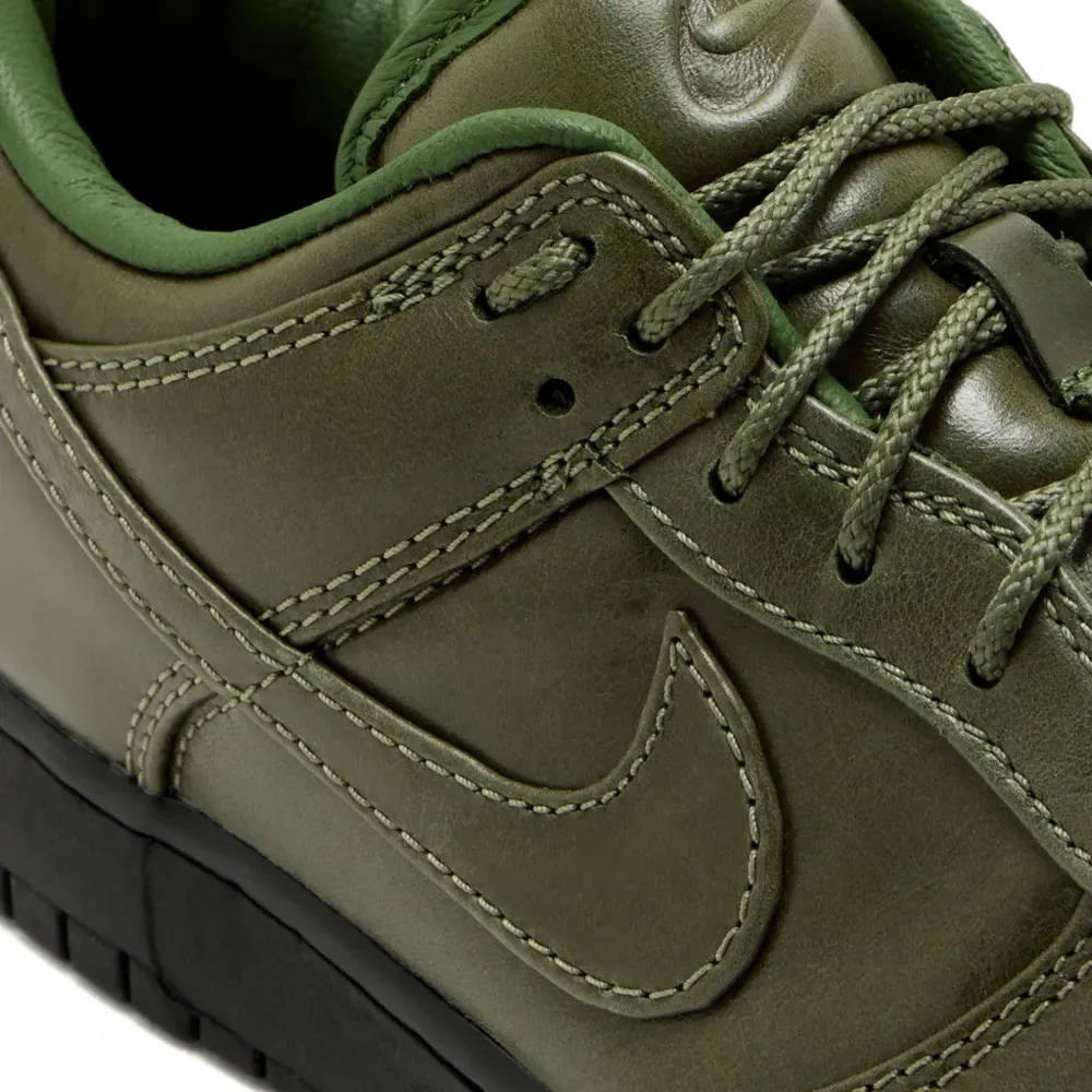 Кроссовки Dunk Low с логотипом