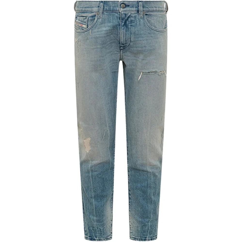 Джинсы с эффектом потертости