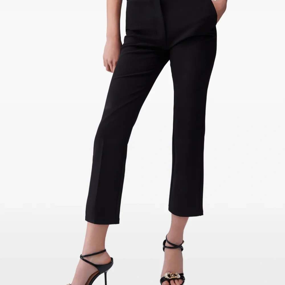 Брюки с заклёпками