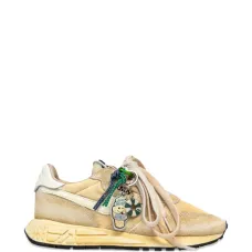 Кроссовки с декоративным элементом