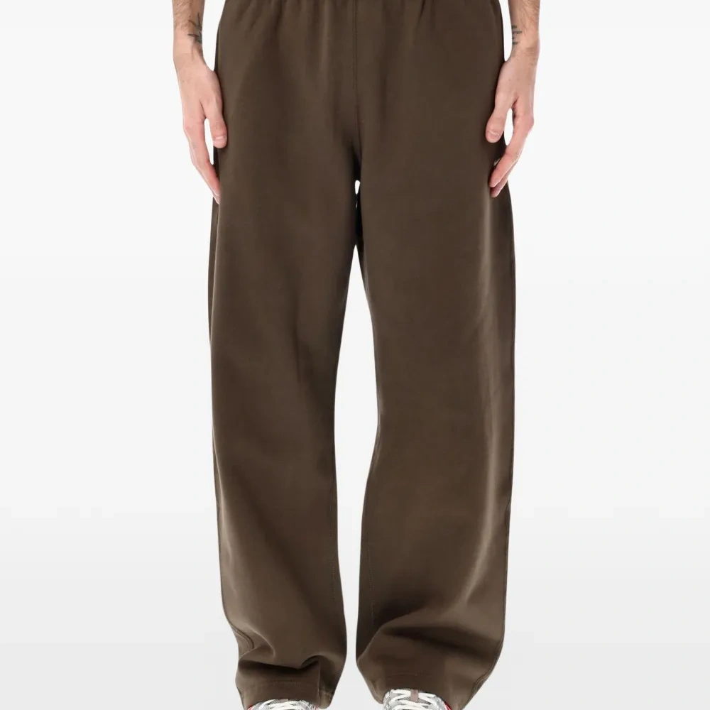 Широкие спортивные брюки Solo Swoosh