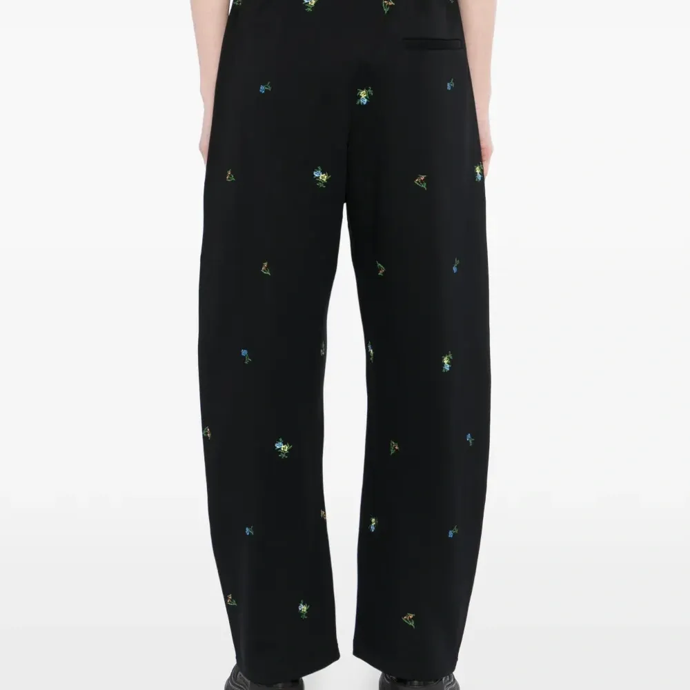 Брюки с цветочной вышивкой