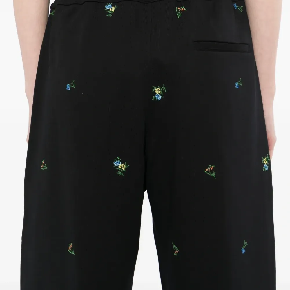 Брюки с цветочной вышивкой