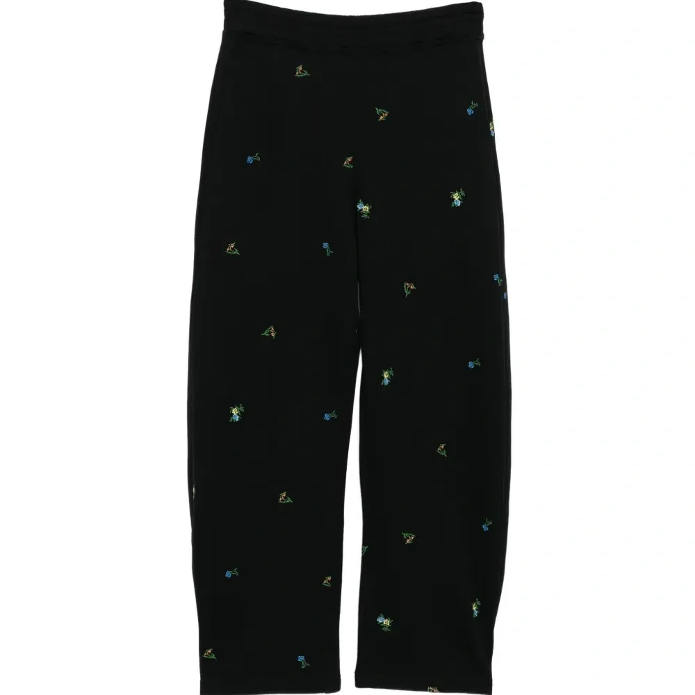 Брюки с цветочной вышивкой