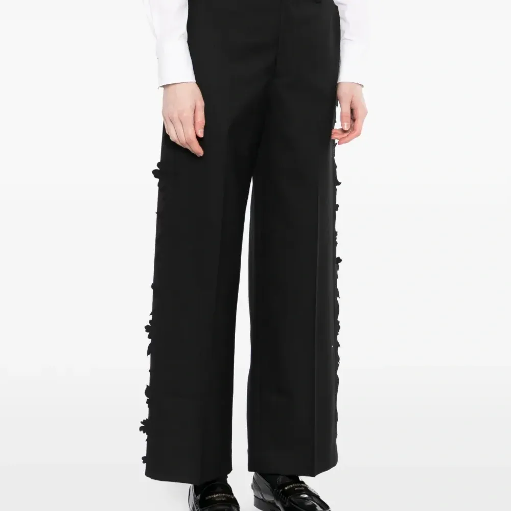 Брюки с оборками по краю