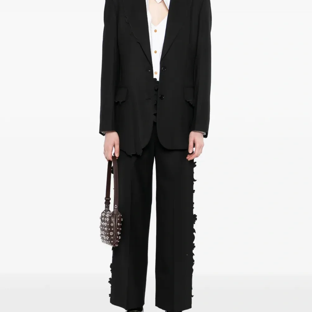 Брюки с оборками по краю