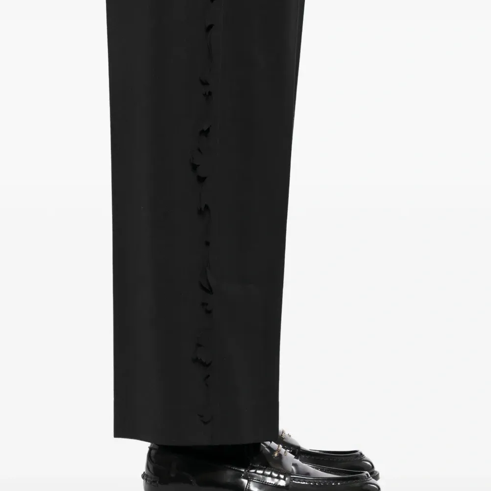 Брюки с оборками по краю