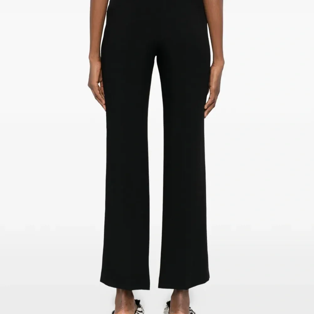 Брюки с застежкой на пуговицах Брюки с застежкой на пуговицах