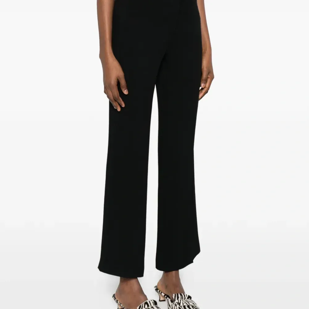 Брюки с застежкой на пуговицах Брюки с застежкой на пуговицах