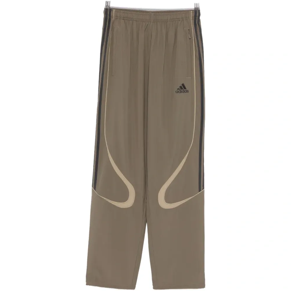 Спортивные брюки Teamgeist Adicolor с полосатыми деталями