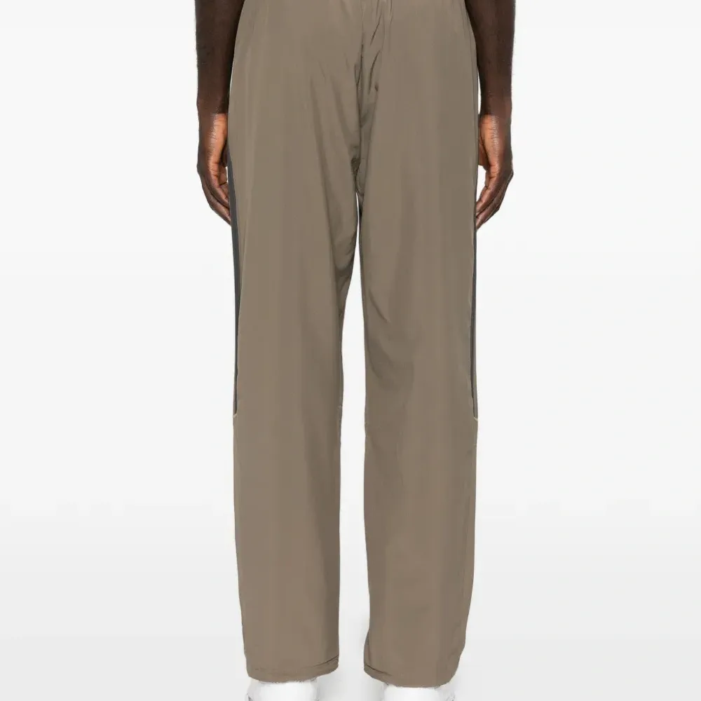 Спортивные брюки Teamgeist Adicolor с полосатыми деталями