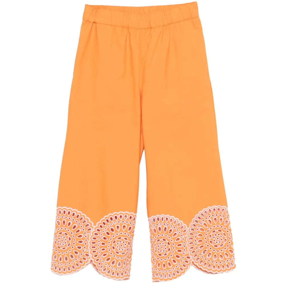 Оранжевые брюки