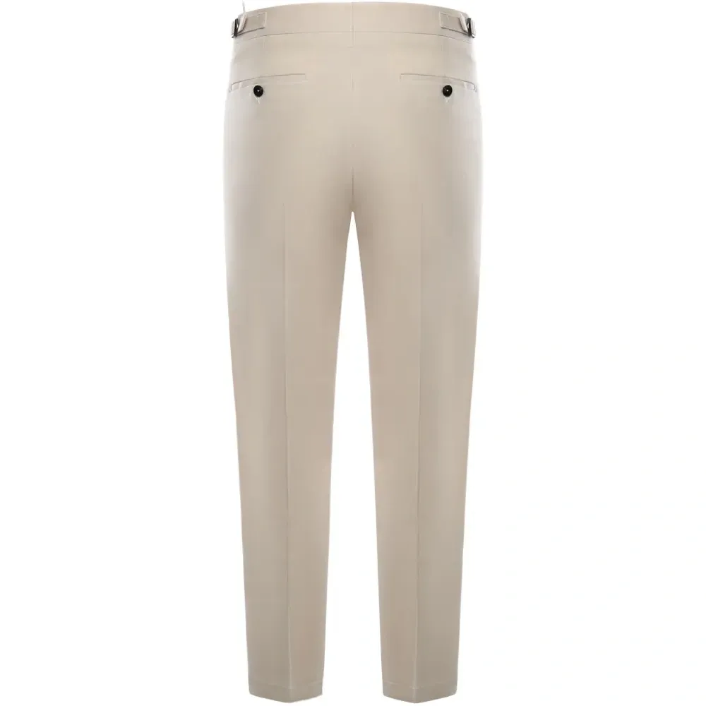 Брюки с защипами и прорезными карманами Брюки с защипами и прорезными карманами